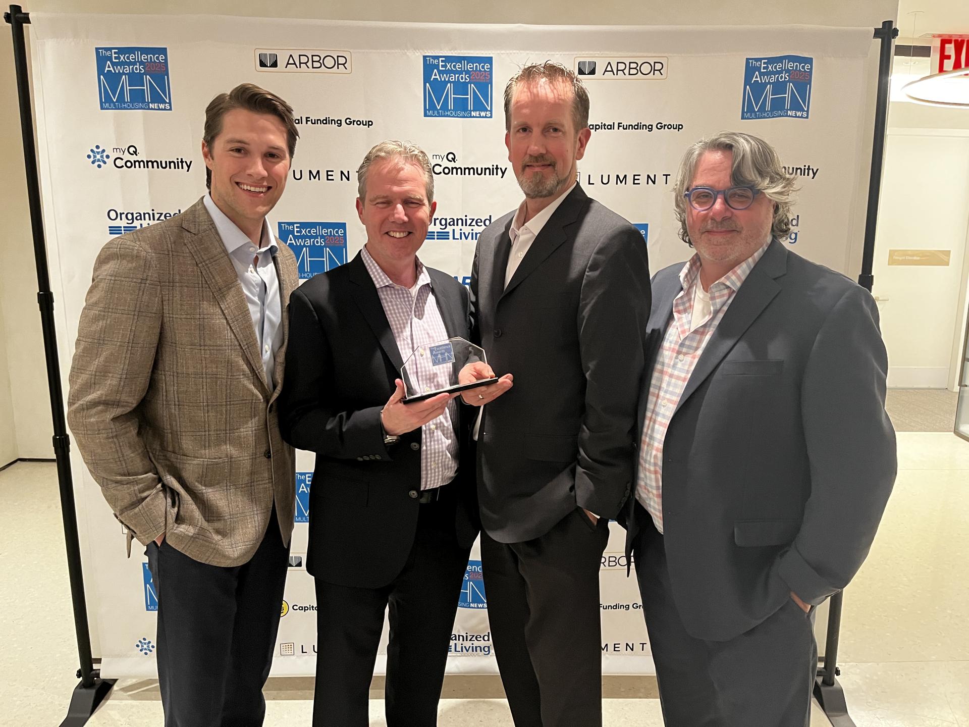 CBT accepts the Multi-Housing News award for Idyl Fenway